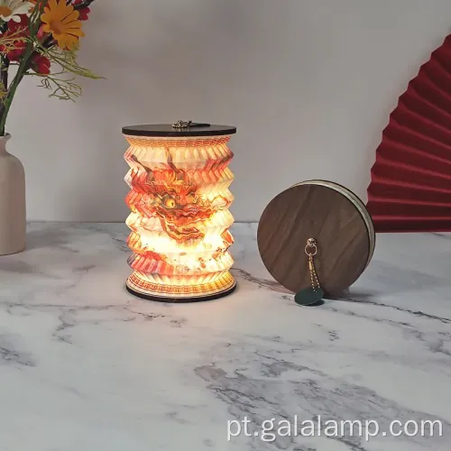 Luz noturna elegante com design de livros dobráveis